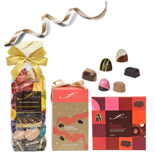 A luxury gift pack featuring gourmet creme ganache chocolates in festive designs