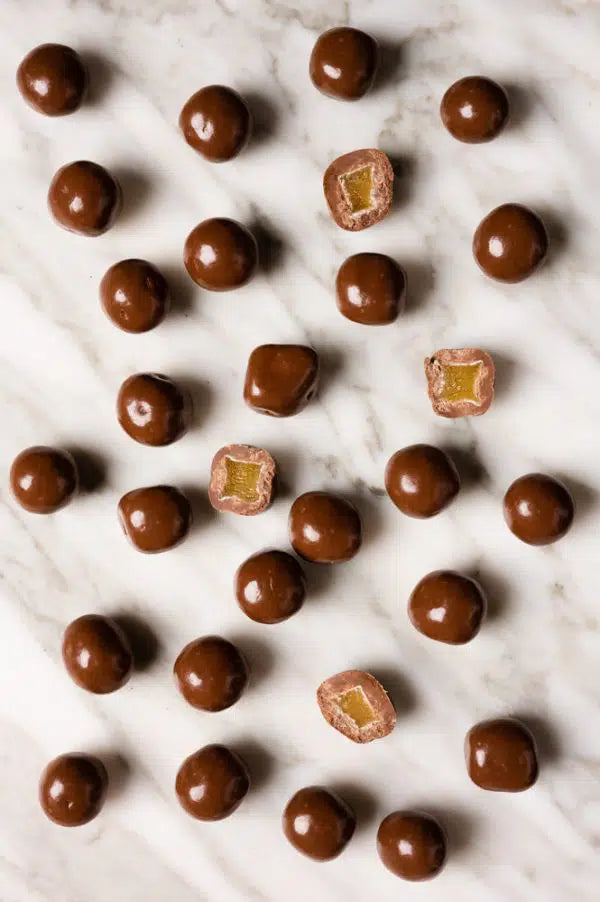 Milk chocolate coated ginger – smooth milk chocolate with warming ginger