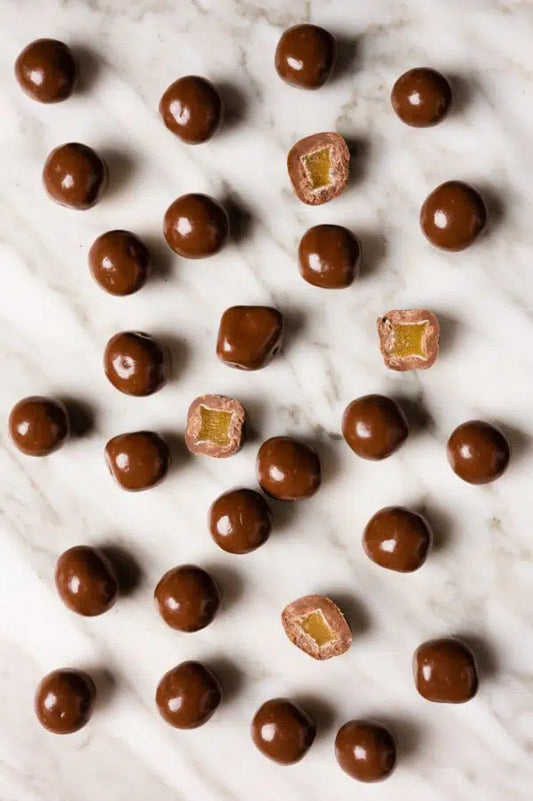 Milk chocolate coated ginger – smooth milk chocolate with warming ginger