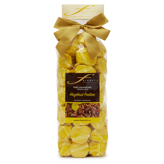 Rich hazelnut praline filled epicurean chocolates in a gift bag — made with pure couverture chocolate. A nutty indulgence from Fardoulis Chocolates.