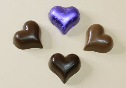 Shop purple foil heart chocolates made with pure couverture chocolate. Choose solid milk or solid dark chocolate for wedding favours, gifts and special events.