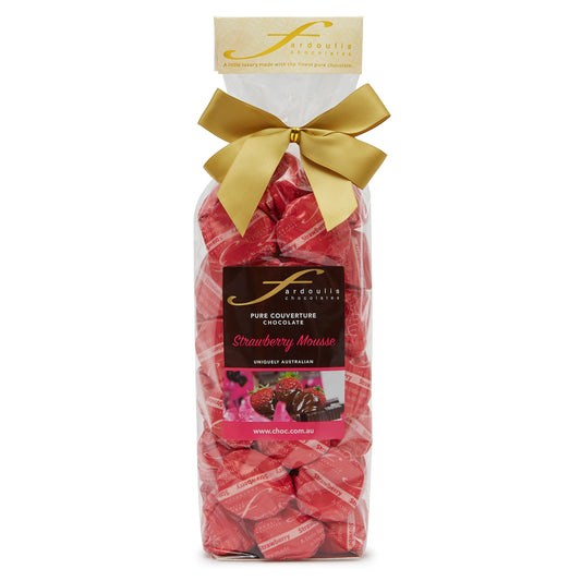 Indulge in our Strawberry Mousse chocolate gift bag — 25 strawberry ganache filled epicurean chocolates wrapped in pure couverture chocolate. A perfect sweet gift from Fardoulis Chocolates.