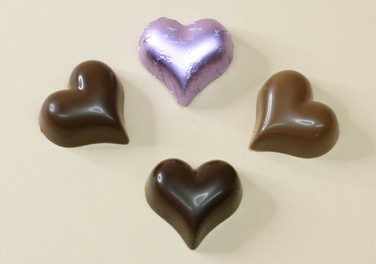 Shop lavender foil heart chocolates made with pure couverture chocolate. Choose solid milk or solid dark chocolate for wedding favours, gifts and special events.