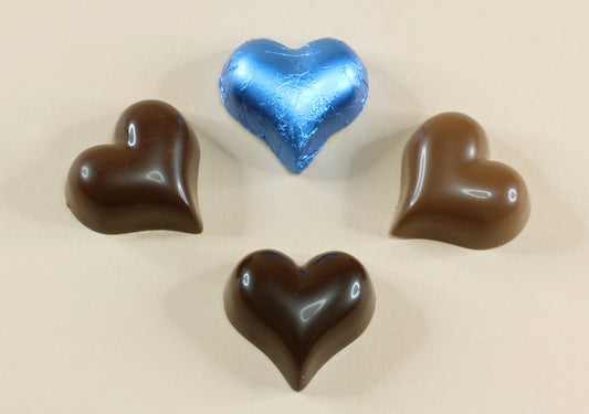 Shop blue foil heart chocolates made with pure couverture chocolate. Choose solid milk or solid dark chocolate for wedding favours, gifts and special events.